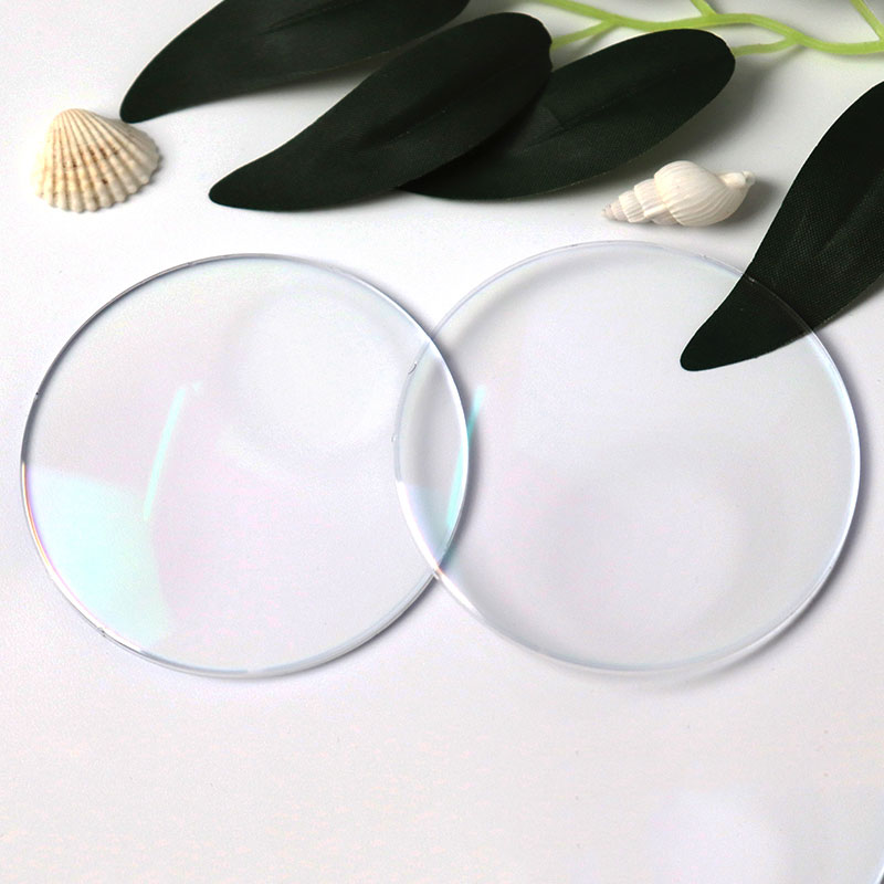 1,56-os bifokális kerek-top objektív HMC